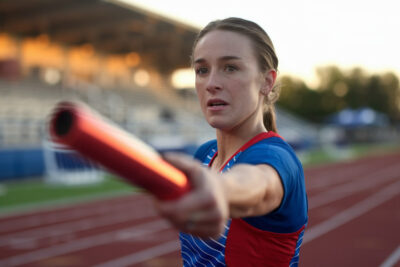 Quatre athlètes français se relaient lors d'une finale mondiale de relais en athlétisme