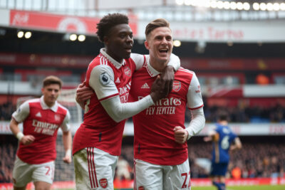 Saka et Rice en action lors d'Arsenal contre Atlético Madrid en Ligue des Champions